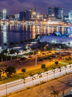 Skyline of capital city Luanda, Luanda bay and seaside promenade with highway during afternoon, Angola, Africa.